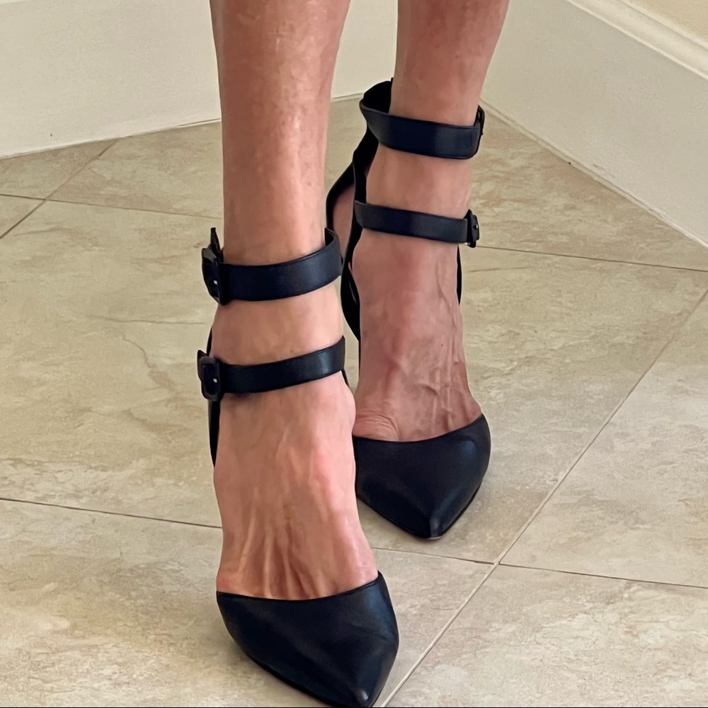 Nine West, lightly worn, strappy high heels. Size 11, black, 4.5 inch heel.